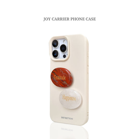 Phone case with 'Gratitude' and 'Happiness' pop sockets on a white background