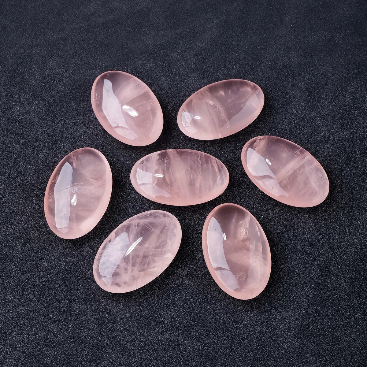 Polished rose quartz palm stone crystal