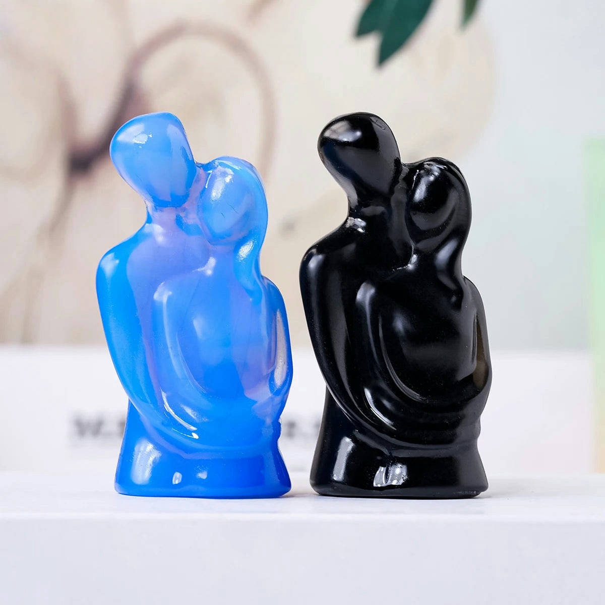 crystal couple embrace statue