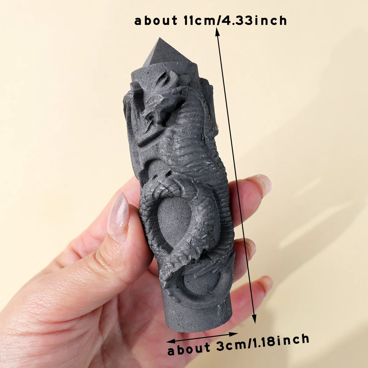 Hand-carved dragon statue in black stone