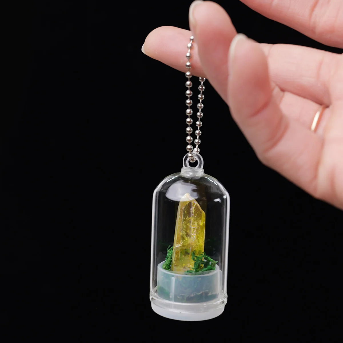 Assorted crystal healing stones in storage box