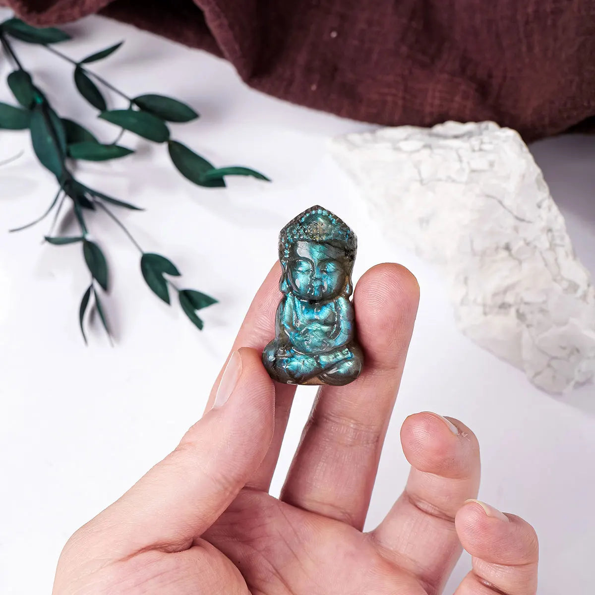 Little buddha made of labradorite